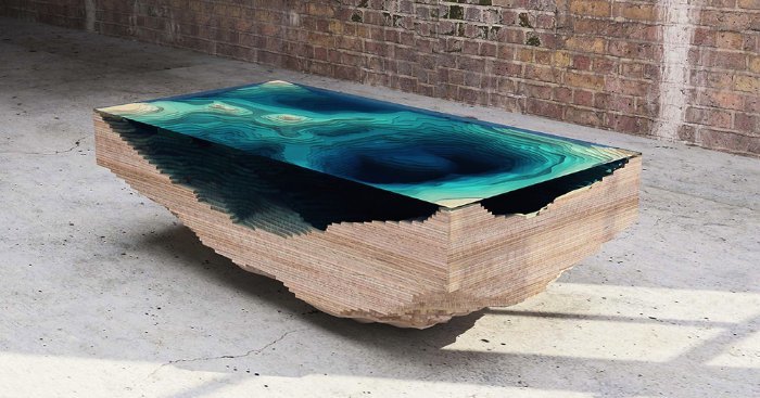 Christopher Duff é o designer responsável pela The Abyss Table, que pode ser traduzida como Mesa Abismo. Ele trabalha na Duffy London e esses renderings que eles liberaram há alguns dias me deixaram com uma curiosidade grande para ver o produto final. Serão construídas 25 dessas mesas e elas poderão ser compradas aqui.