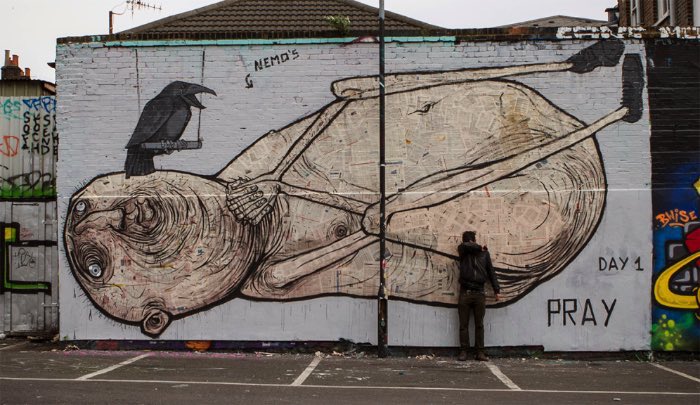 Nemos é um artista de rua, na falta de um título e descrição melhor. Seu trabalho pode ser meio estranho algumas vezes, já que suas enormes obras de arte incluem corpos que de decompõe entre outras coisas.