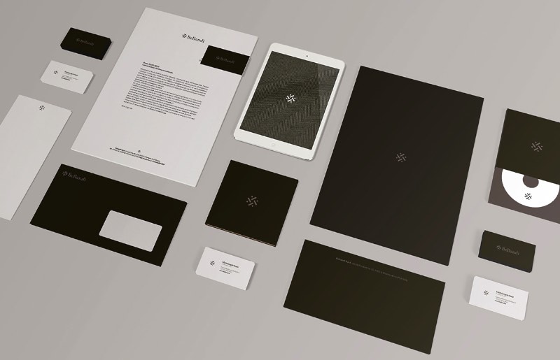 Mattia Compagnucci é um designer italiano que vive e trabalha aqui em Berlin. Me deparei com o portfólio dele tem algum tempo mas, quando vi o seu trabalho de identidade visual para a Bellandi S.p.A., sabia que eu publicar esse trabalho aqui. Bellandi S.p.A. é uma empresa que trabalha na produção de tecidos e os valores da empresa são de competência, confiança e inovação. Pensando nisso, Mattia Compagnucci criou a identidade visual abaixo.