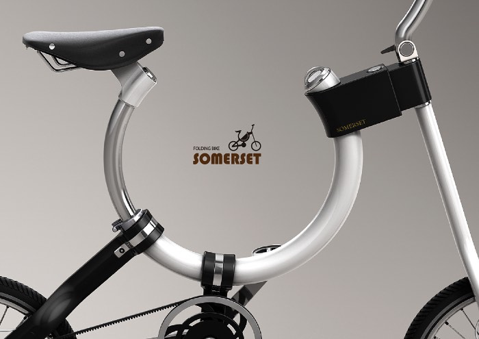 Não sei ao certo se essa bicicleta da Somerset ainda pode ser considerada uma bike. Afinal, essa é a menor bicicleta dobrável que já vi e seu visual baseado em uma forma que me lembra uma ferradura, deixa tudo ainda mais estranho. Mas é isso que transforma essa bicicleta em algo especial.